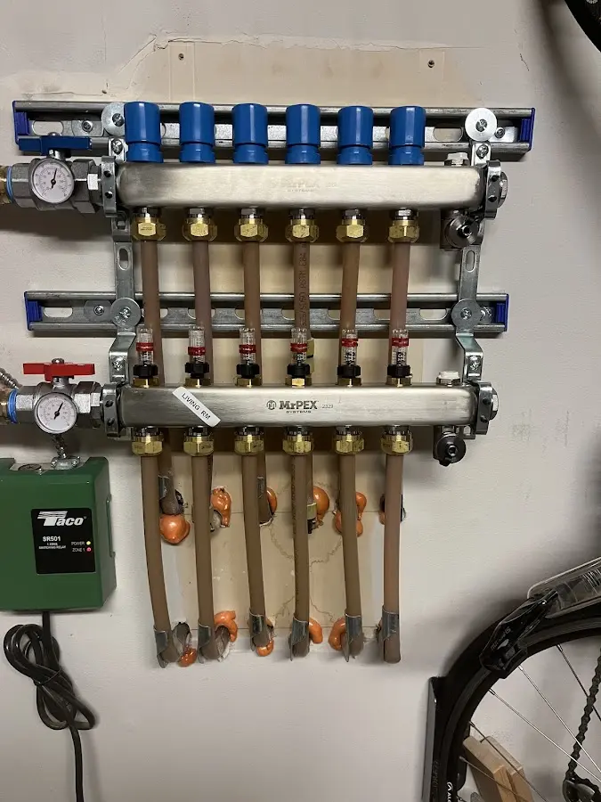 Plumber performing Leak Detection at a residential property in East Haven